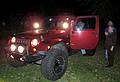 Joyce, Norma, and Carl inspecting TJ's Jeep.<br />Nov. 13, 2010 - At Paul and Norma's in Tewksbury, Massachusetts.