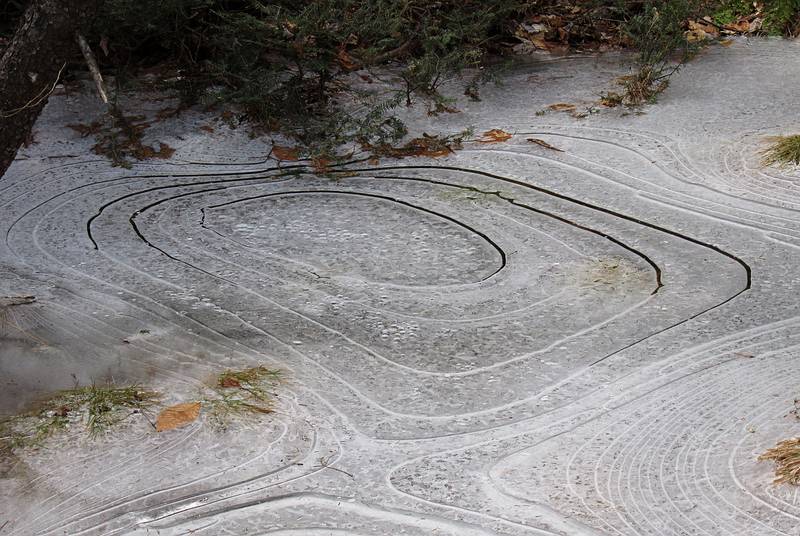 Contour lines on ice.<br />Hiking along Newbury Trail to Mt. Sunapee.<br />Dec. 4, 2010 - Sunapee State Park, New Hampshire.