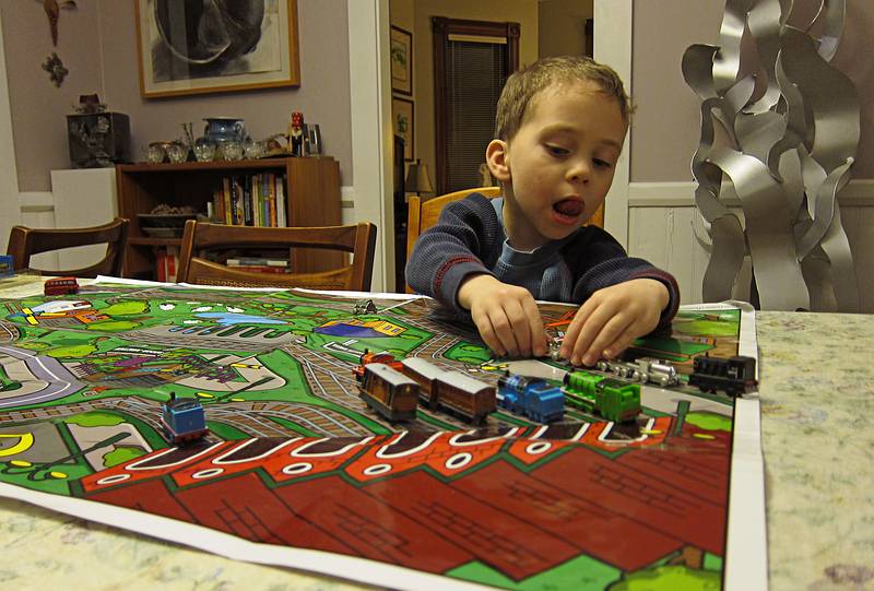 Matthew does not go anywhere without packing some of his trains.<br />Dec. 17, 2010 - Merrimac, Massachusetts.