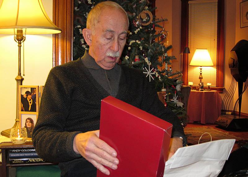 Ronnie opening one of his Christmas presents.<br />Dec. 25, 2010 - Christmas Day at Joyce and Egils' in Merrimac, Massachusetts
