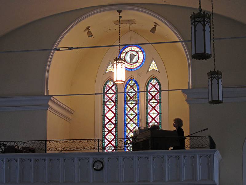 The organist rehearsing before the service.<br />Memorial service for Christina (Carl's, Eric's, Melody's, and Nathan's grandmother).<br />Jan. 8, 2011 - Church of the Nativity, Merrimac, Massachusetts.