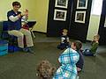 Miranda, Matthew, and other kids listening to a lecture about marine mammals.<br />March 5, 2011 - Mass Audubon at Joppa Flats, Newburyport, Massachusetts.
