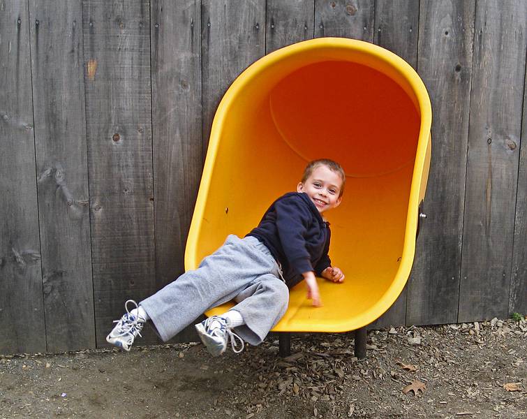 Matthew at the exit of a slide,.<br />April 18, 2011 - Old Sturbridge Village, Sturbridge, Massachusetts.