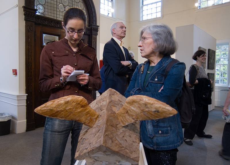 Joyce providing some info to a reporter.<br />'small obsession: artists' dollhouses and other obsessively small works of art.'<br />May 22, 2011 - Somerville Museum, Somerville, Massachusetts.