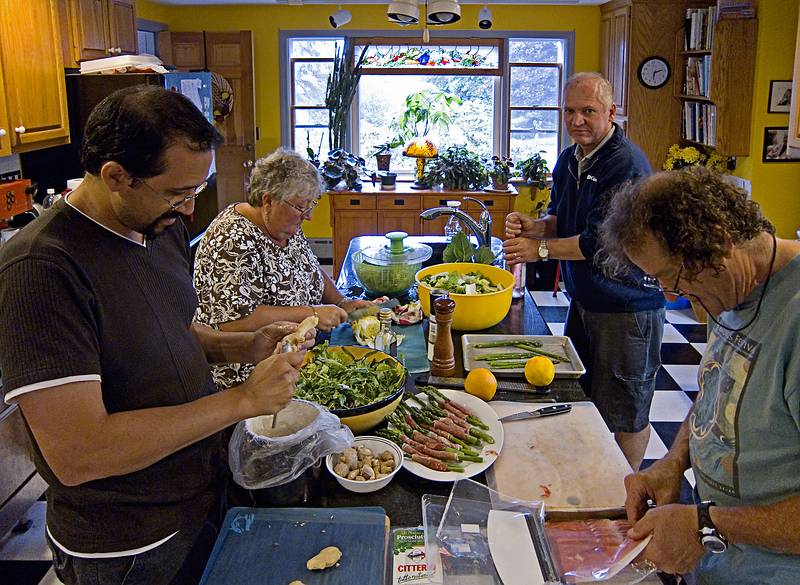 Eric, Norma, Tom, and Paul preparing food for a feast.<br />June 17, 2011 - At Paul and Norma's in Tewksbury, Massachusetts.