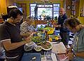 Eric, Norma, Tom, and Paul preparing food for a feast.<br />June 17, 2011 - At Paul and Norma's in Tewksbury, Massachusetts.