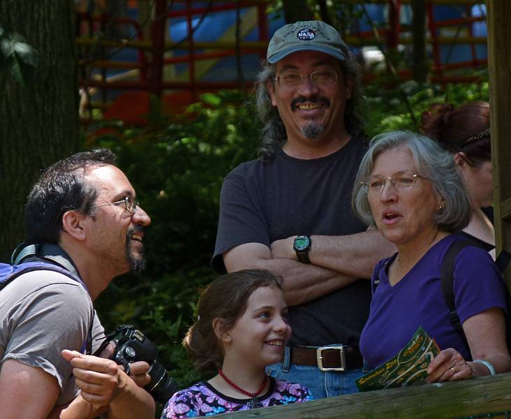 Eric, Miranda, Carl, and Joyce amused by the camel riders.<br />June 18, 2011 - Southwick Zoo, Mendon, Massachusetts.