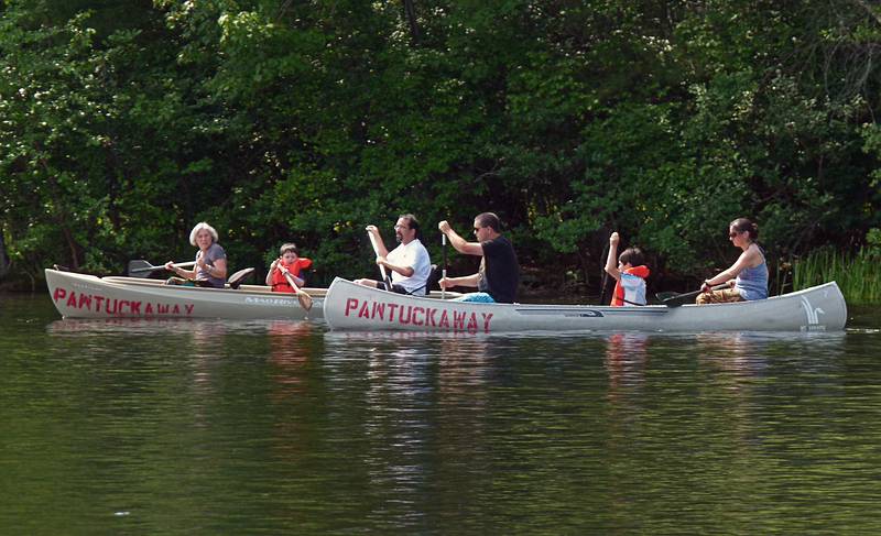 Joyce, Marks, and Eric in the lead canoe, Sati, Gujn, and Melody behind them.<br />June 20, 2011 - Pawtuckaway State Park, Nottingham, New Hampshire.
