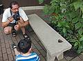 Eric about to photograph the butterfly while Marks looks on.<br />June 27, 2010 - The Butterfly Place in Westford, Massachusetts.