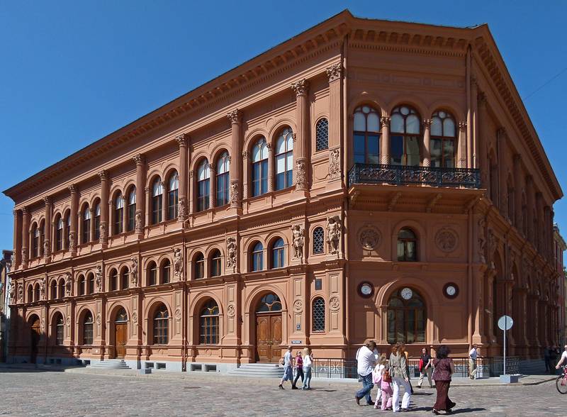 Stock Exchange building in the shadow of Riga Cathedral.<br />June 3, 2011 - Riga, Latvia.