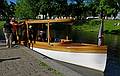 Boarding boat for dinner on Kipsala (Kip Island) on the far side of the Daugava River.<br />June 3, 2011 - Riga, Latvia.