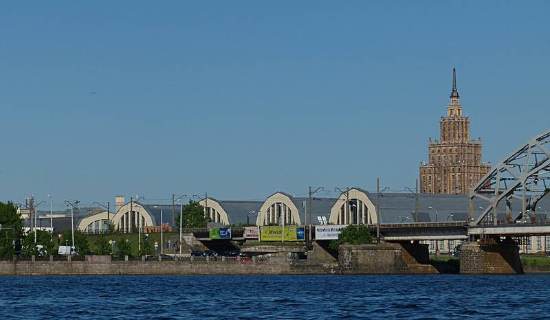 Central market buildings with the Latvian Academy of Sciences building in back.<br />June 3, 2011 - Riga, Latvia.