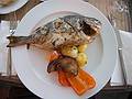 Grilled dorada fillet (per menu but it looks like a whole fish to me).<br />June 3, 2011 - Riga, Latvia.