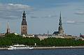 The Riga Doms and the St. Peter's Church dominate the skyline.<br />Views from the Vanu Bridge over the Daugava River.<br />June 5, 2011 - Riga, Latvia.