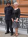 Daina posing with a local policeman.<br />June 12, 2011 - Riga, Latvia.