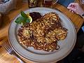 Potato pancakes.<br />Plostkrogs (Plost tavern) on Highway P130.<br />June 6, 2011 - About 5.6 Km SE of Sabile, Latvia.