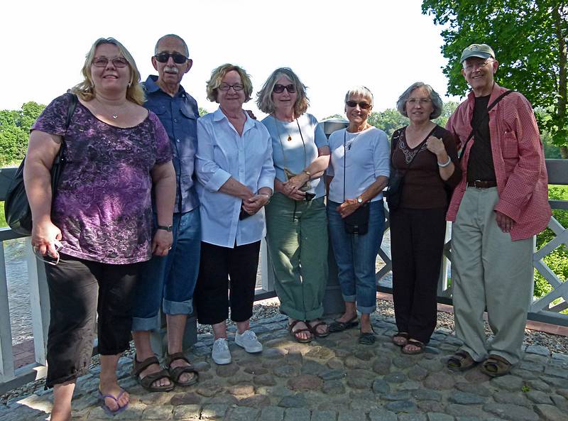The tour group: Linda, Ronnie, Carolyn, Betsy, Baiba, and Chuck.<br />Egils is behind the camera and Ivan is tending the bus.<br />June 6, 2011 - Kuldiga, Latvia.