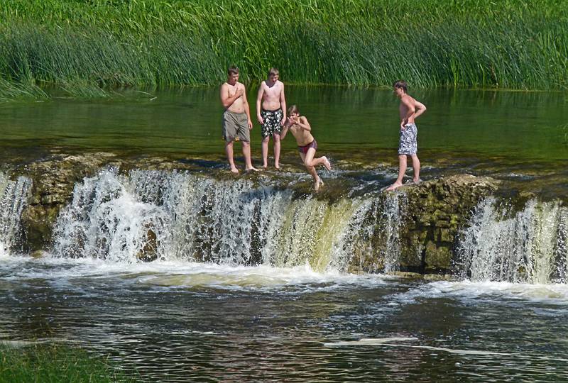 Taking advantage of a hot summer day.<br />June 6, 2011 - Kuldiga, Latvia.