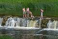 Taking advantage of a hot summer day.<br />June 6, 2011 - Kuldiga, Latvia.