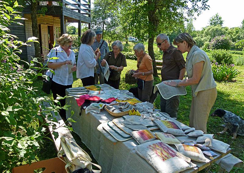The farmer's friend showing off her craft to<br />Carolyn, Betsy, Chuck, Joyce, Baiba, and Ronnie.<br />On an eco farm.<br />June 8, 2011 - North of Aluksne, near the Estonian border, Latvia.