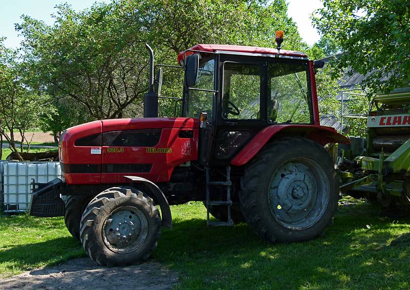 A Belarus tracktor.<br />On an eco farm.<br />June 8, 2011 - North of Aluksne, near the Estonian border, Latvia.
