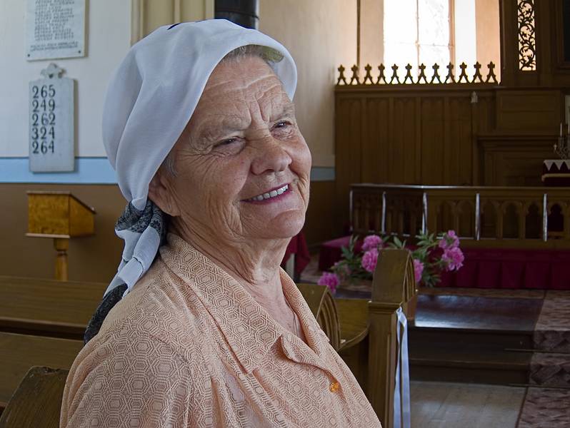 This friendly woman appeared and showed us around.<br />Velena Ev. Lutheran Church.<br />June 9, 2011 - Velena, Vidzeme, Latvia.