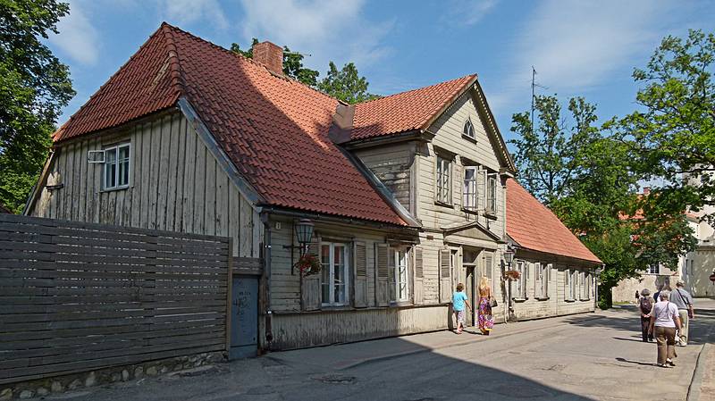 Building in the shadow of the church.<br />June 10, 2011 - Cesis, Latvia.