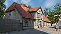 Building in the shadow of the church.<br />June 10, 2011 - Cesis, Latvia.