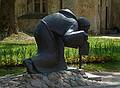 Monk with lantern sculpture next to the church.<br />June 10, 2011 - Cesis, Latvia.