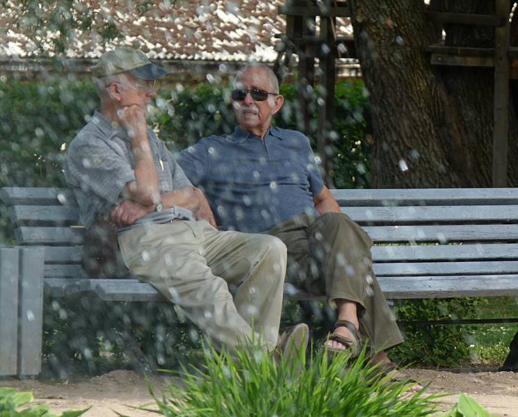 Chuck and Ronnie behind fountain droplets.<br />Maija Park.<br />June 10, 2011 - Cesis, Latvia.