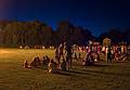 The crowd lit by the bonfire.<br />Old Home Days bonfire evening.<br />August 12, 2011 - Athletic field in front of the Donahue School, Merrimac, Massachusetts.