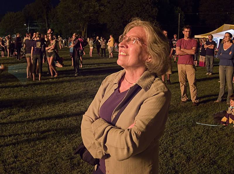 Joyce, lit by the bonfire.<br />Old Home Days bonfire evening.<br />August 12, 2011 - Athletic field in front of the Donahue School, Merrimac, Massachusetts.