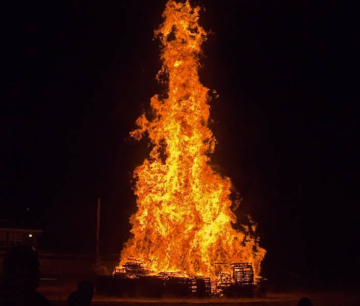 The bonfire, about 40 to 50 feet hight.<br />Old Home Days bonfire evening.<br />August 12, 2011 - Athletic field in front of the Donahue School, Merrimac, Massachusetts.