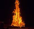 The bonfire, about 40 to 50 feet hight.<br />Old Home Days bonfire evening.<br />August 12, 2011 - Athletic field in front of the Donahue School, Merrimac, Massachusetts.