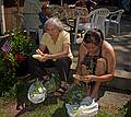 Joyce and Melody shucking corn.<br />August 17, 2011 - At Marie's in Lawrence, Massachusetts.
