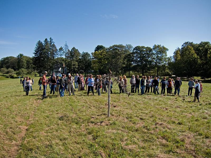 The crowd gathering to hear Michele Koenig Augery talk about her sculpture.<br />Artists' tour of 'Play', an Outdoor Sculpture Show at Maudslay.<br />Sept. 17, 2011 - Maudslay State Park, Newburyport, Massachusetts.
