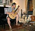 Oscar playing one of the four guitars he has made.<br />The first guitar he make has been sold.<br />Sept. 24, 2011 - At Oscar and Leslie's in North Andover, Massachusetts.