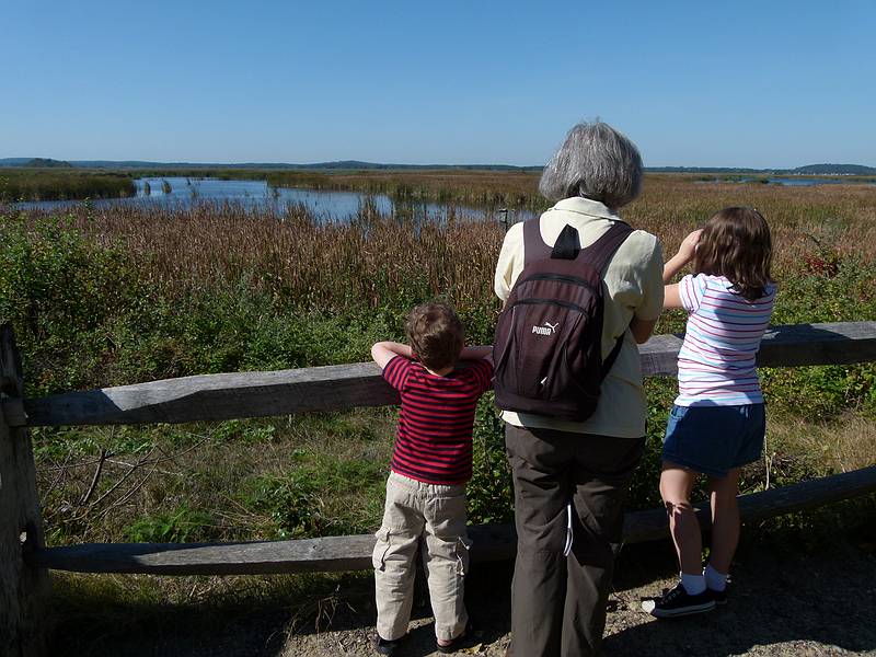 Matthew, Joyce, and Miranda at the far end of the Marsh Loop Trail.<br />At Hellcat Wildlife Observation Area.<br />Oct. 8, 2011 - Parker River National Wildlife Refuge, Plum Island, Massachusetts.