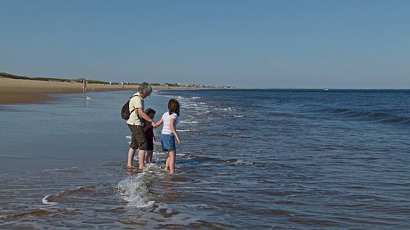 Joyce, Matthew, and Miranda.<br />It didn't take long for the kids to get wet from head to toe. Fortunately, it was about 80 F.<br />Oct. 8, 2011 - Parker River National Wildlife Refuge, Plum Island, Massachusetts.