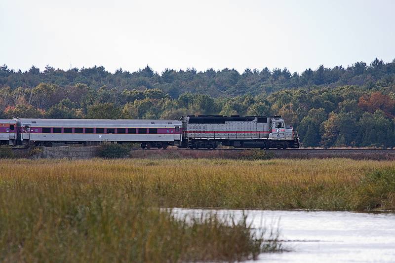 The Boston to Newburyport train cuts across the marsh.<br />Little River section of the park.<br />Oct. 17, 2011 - Old Town Hill (Trustees of Reservation), Newbury, Massachusetts.