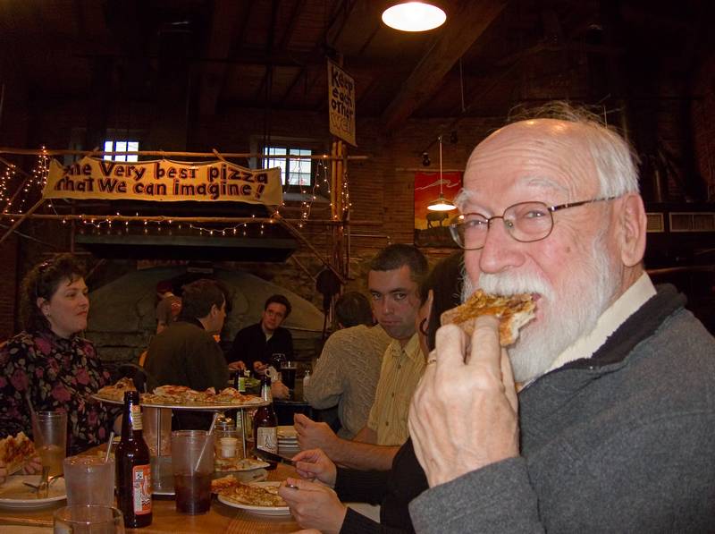 Egils munching on a pizza piece.<br />Miranda's birthday.<br />Dec. 26, 2011 - Flatbread Company, Amesbury, Massachusetts.