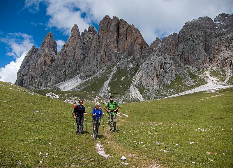 Melody, Joyce, and Sati pose in front of Gran Fermeda?<br />Hike from Seceda cable car terminal to Puez hut.<br />July 26, 2011 - NE of St. Ulrich/Ortisei, Italy.