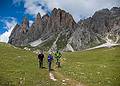 Melody, Joyce, and Sati pose in front of Gran Fermeda?<br />Hike from Seceda cable car terminal to Puez hut.<br />July 26, 2011 - NE of St. Ulrich/Ortisei, Italy.