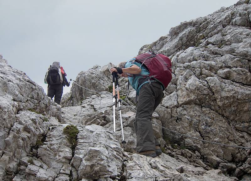 Melody and Joyce negociating a cabled portion of trail #216.<br />Hike from cable car terminal at Rifugio Faloria to Rifugio Vandelli near Lake Sorapiss.<br />July 29, 2011 - East of Cortina d' Ampezzo, Italy.