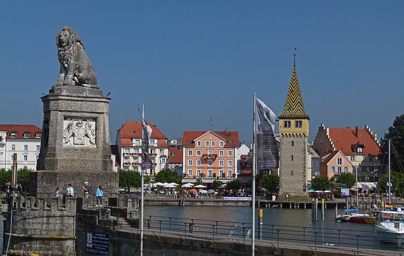 Entering the Lindau harbor.<br />Bavarian Lion and the Mangturm. the old lighthouse.<br />August 2, 2011 - Lindau, Bavaria, Germany.