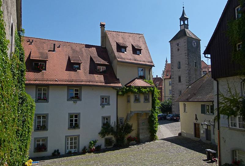 Tower of St. Peter's Church beyond the square.<br />August 2, 2011 - Lindau, Bavaria, Germany.