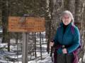 Joyce at the junction of Livermore Rd, and Kettles Path.<br />Hike from the Depot to the Scaur via Livermore, Kettles, and Scaur trails.<br />March 11, 2012 - Waterville Valley, New Hampshire.