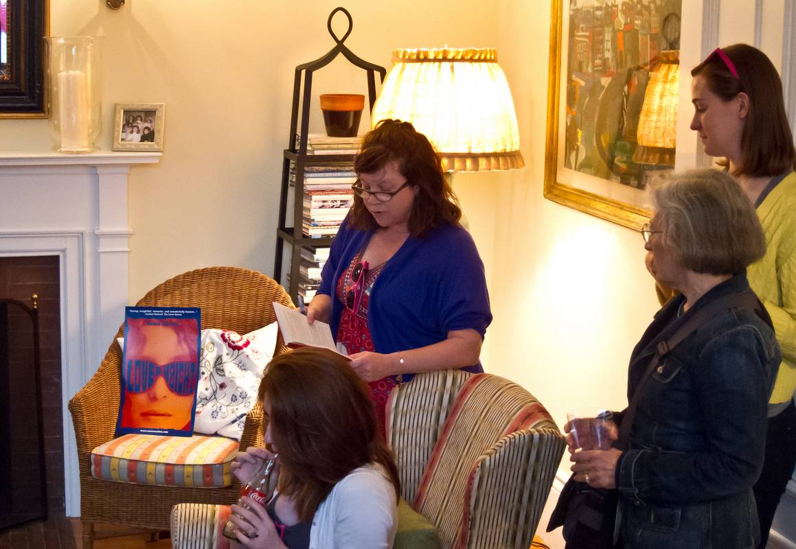 Susan reading a passage out of her new book.<br />Reception at Susan Carlton's house for her book "Love & Haight".<br />March 25, 2012 - Andover, Massachsetts.