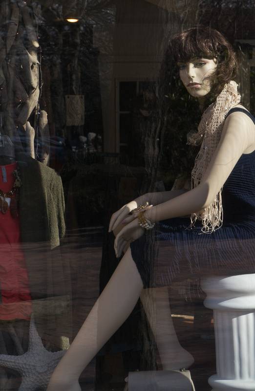 Mannequin in store window along Inn Street.<br />March 8, 2012 - Newburyport, Massachusetts.