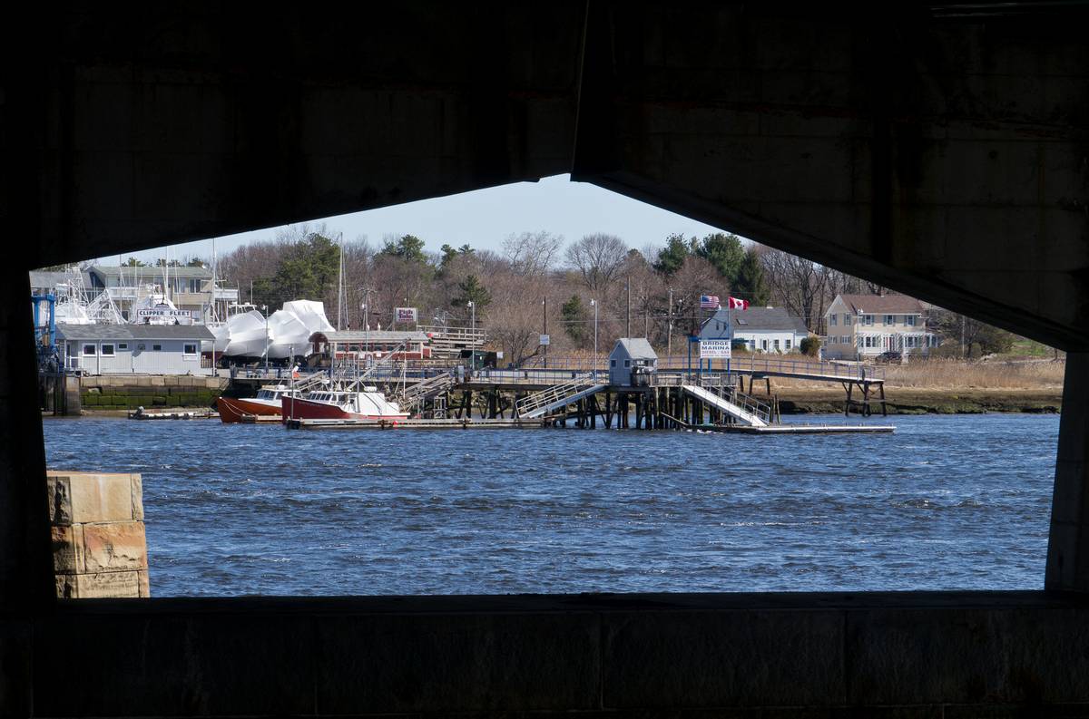 Looking through Route US-1 bridge at Ring's Island Marina in Salisbury.<br />March 30, 2012 - Newburyport, Massachusetts.